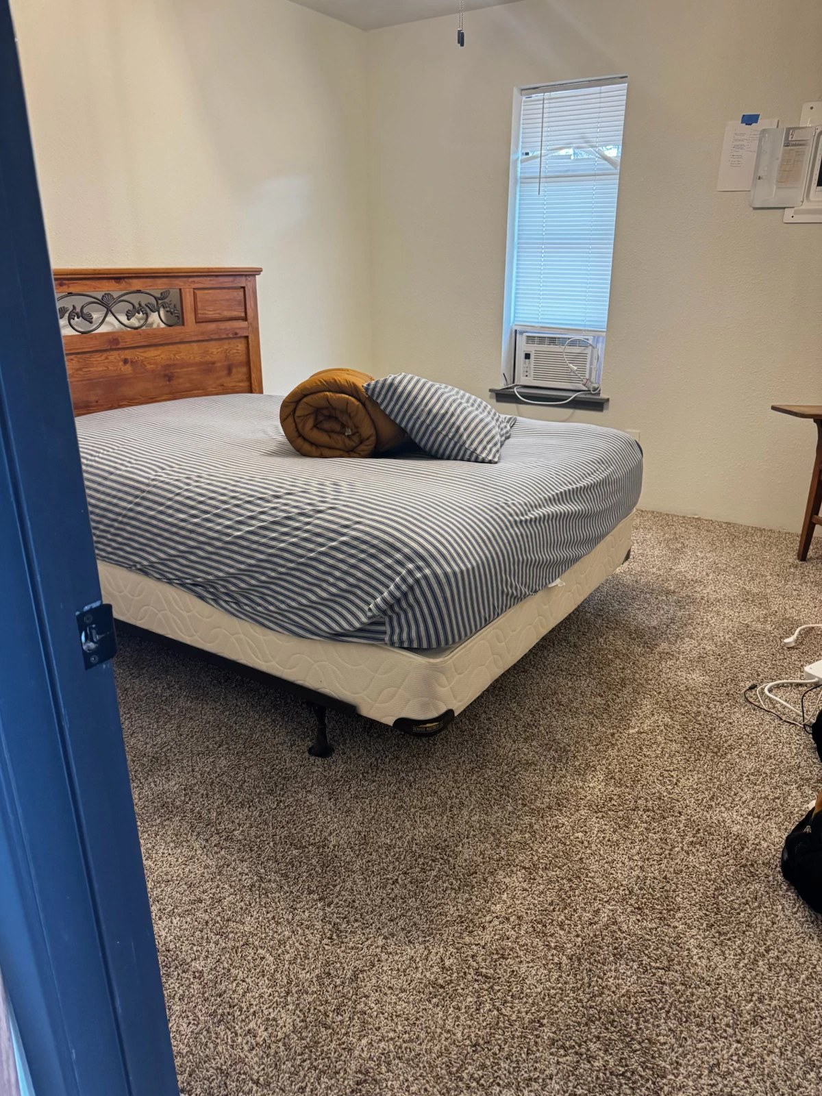 Bedroom with freshly installed wall-to-wall carpet